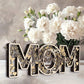 Дървена декорация „MOM – Love You“ – символ на безкрайната майчина любов